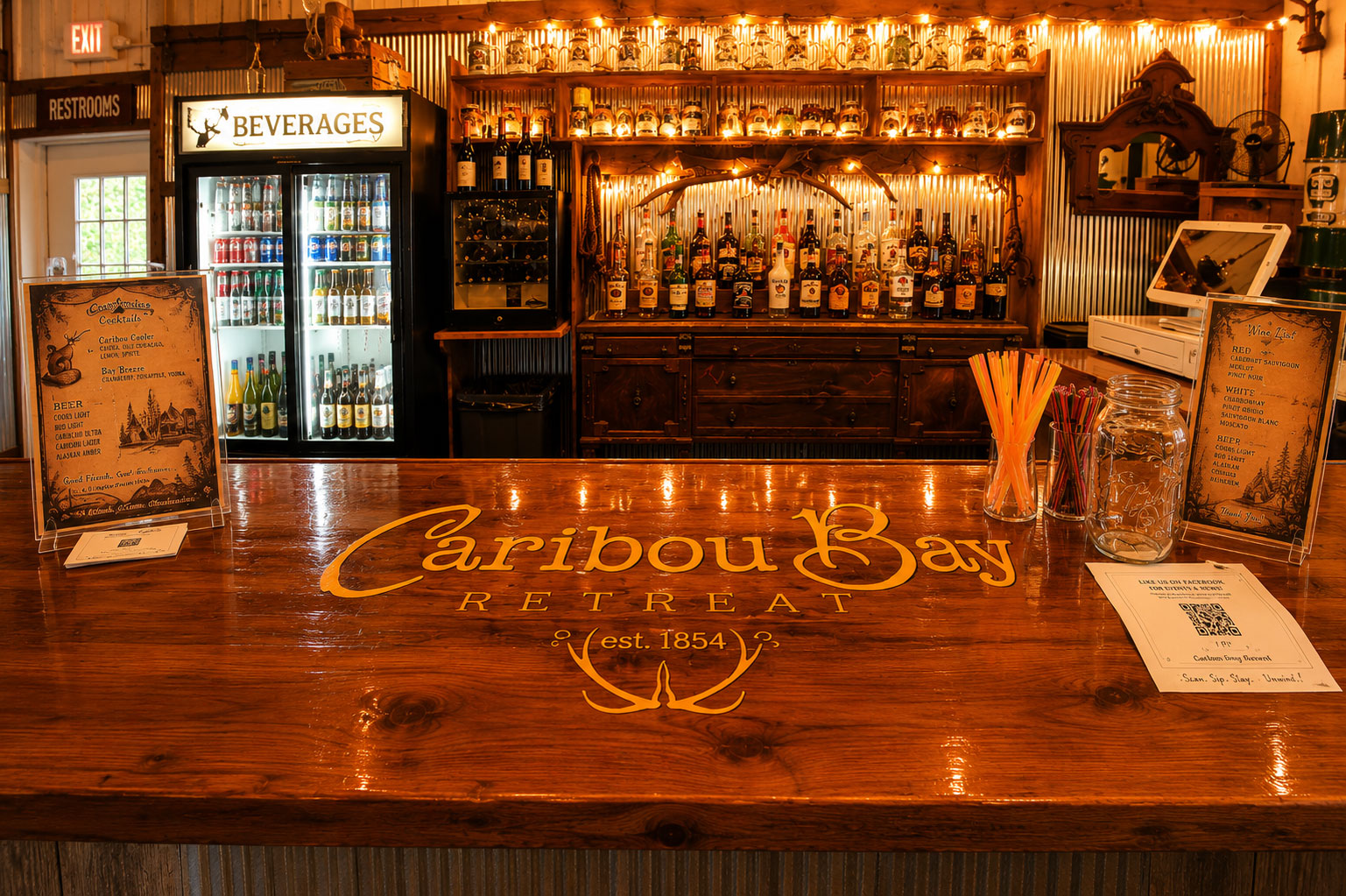 Handcrafted rustic wedding bar at Caribou Bay Retreat, a premier Central Wisconsin wedding venue with signature cocktails and romantic reception atmosphere.